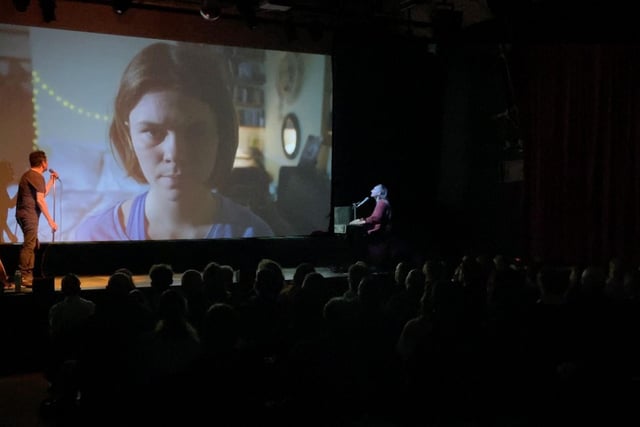 'Sung to Film' - Super Connected  fuses cinema, a live concert and theatre performance rolled into one.