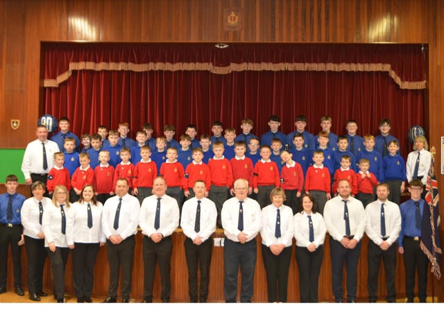 Boys, officers and leaders pictured to mark the 80th anniversary of the company.