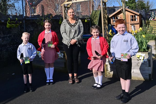 The Deputy Mayor of Antrim and Newtownabbey, Councillor Leah Smyth, with pupils from Parkgate Primary School who received their seeds and trowels