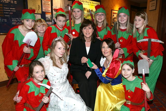 Angela Kearns (Snow White) and Zara Levear (Fairy Queen) and the dwarfs pictured with Carol Campbell, hotel manageress, of The Lodge Hotel one of the sponsors of the Provincial Players Snow White pictured in 2007