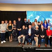 Winners of the 2024 Sport Lisburn & Castlereagh Sports Awards supported by Draynes Farm, with Chair of Sport Lisburn & Castlereagh, Jimmy Walker; Chair of the Communities and Wellbeing Committee, Councillor Jonathan Craig; Lady Mary Peters; Mr David Burns, Chief Executive of LCCC; Sponsor, Mrs Stella Draynes; Special guest Mark Clougherty, and host Claire McCollum. Pic credit: LCCC