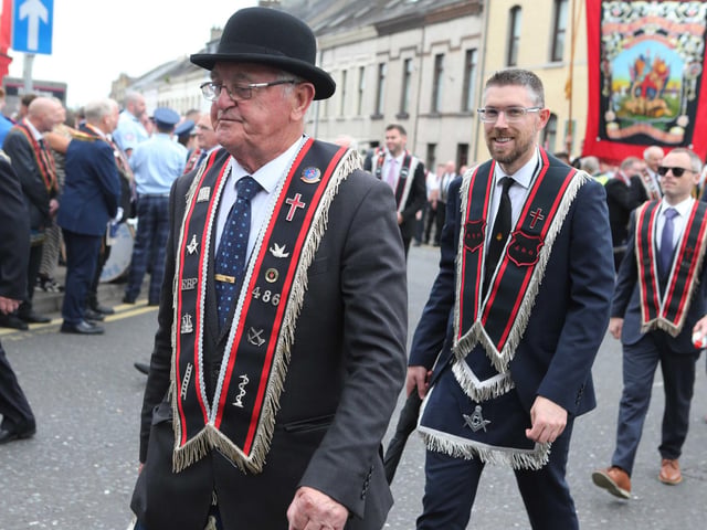 Brian Sweeney, James Mills and Jason Craig from Ballyoglagh RBP taking part in the Larne parade.