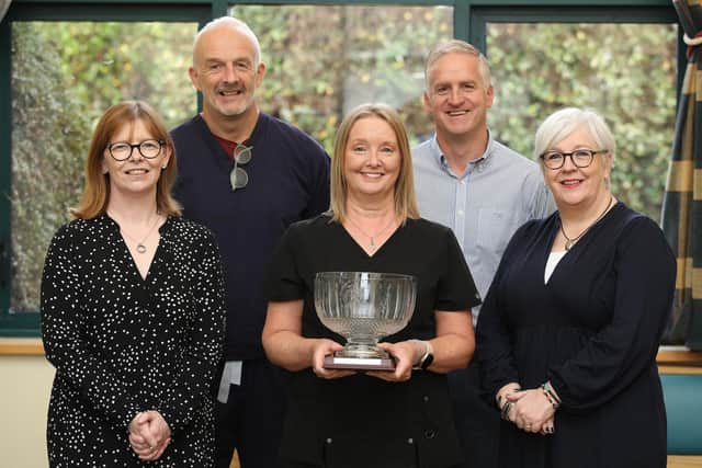 Dr Ursula Mason, Chair of RCGPNI, awarding Old School Surgery, Greenisland with Practice of the Year Award 2023. Picture: Phil Smyth Photo