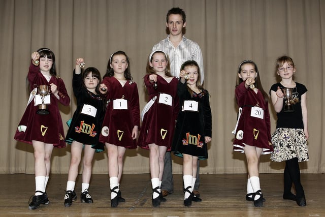 DELIGHTED DANCERS...Prize winners in the Coleraine Irish Dancing Festival pictured with Adjudicator Ali McKeown in 2008.