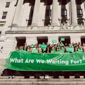 Macmillan cancer campaigners on the steps of Stormont. Credit Macmillan Cancer