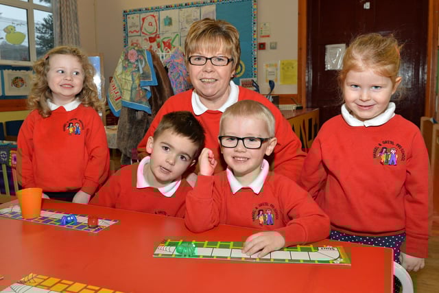 Hansel and Gretel Pre-school assistant, Ann McRoberts is pictured with Ella, Brody, Oliver and Louisa on her last day at the school in 2015. INLT 05-019-PSB