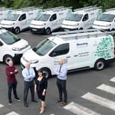 Housing Executive Chair Nicole Lappin inspects the organisation’s new fleet of 10 electric vans along with staff members (l-r) David Roe, Fleet Support Operations Manager,
Stephen Moore, Assistant Director of the Direct Labour Organisation (DLO), and John Lamont, DLO Operations.