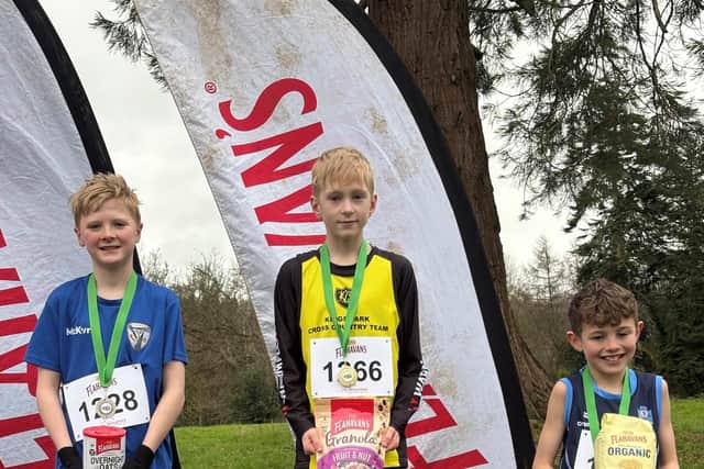 (L-R): Sean Monaghan, St Patrick’s Primary School (2nd), Harry Wilson, Kings Park Primary School (1st), and Hayden Gibson, Ballydown Primary School (3rd) at the third round of the 2024-2025 Flahavan’s Athletics NI Primary School Cross Country League at Ulster University Coleraine.