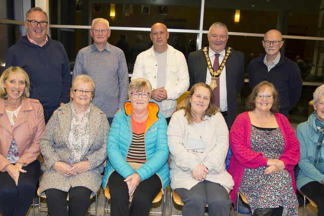 The Mayor of Causeway Coast and Glens Borough Council Councillor Ivor Wallace pictured with some of those who attended the event in Cloonavin to recognise the work of local Food Banks and Christians Against Poverty.
