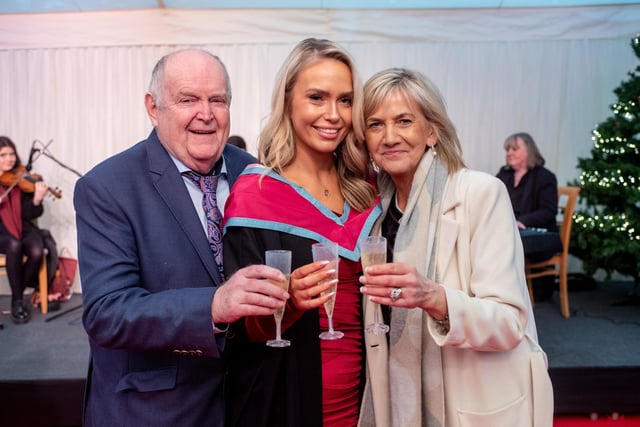 Rachel McGlaughlin graduated with a Masters degree in Marketing. She is pictured celebrating with her parents Ruth and David.