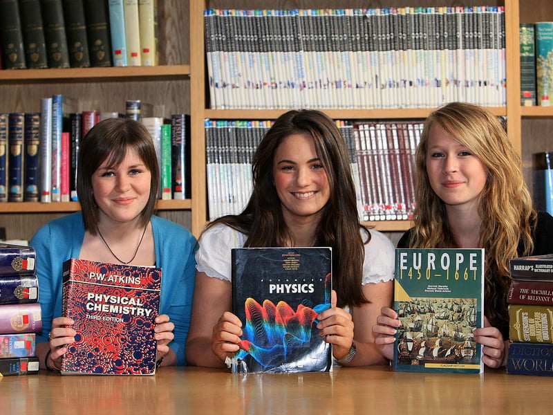 Ballymena Academy pupils Kathryn Johnston Laura Bateman and Jillian Wallace relaxing after getting their GCSE results in 2007.