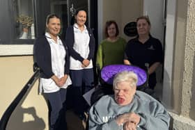 L-R: Samantha Boyle, Learning Disability Occupational Therapist; Caoimhe Kirkpatrick, Learning Disability Occupational Therapist; Sonia Bradley, Duncreggan Residential Home Manager; Sarah Toner, Duncreggan, standing with Elizabeth in her new bespoke moulded wheelchair.
