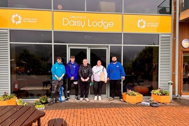Portadown young people help spruce up Daisy Lodge in Co Down with some gardening and painting