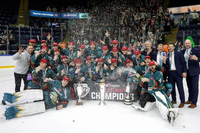 Belfast Giants team celebrate the 'treble' after being crowned Elite Ice Hockey League Champions, Challenge Cup Champions and the EIHL Playoffs Champions at the Motorpoint Arena, Nottingham. Photo by William Cherry/Presseye