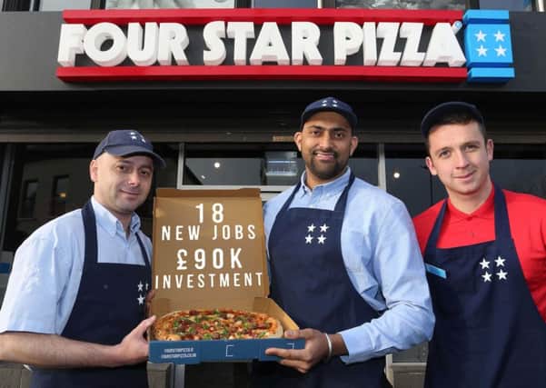 Bobby Singh (centre), owner of the new Coleraine Four Star Pizza store, is joined by team members Rui Pedro Ribeiro (left) and Jad Dorrian (right) to celebrate the opening of the store.  The store officially opened its doors at 42 Railway Road, Coleraine, as part of an over Â£90,000 investment and created 18 new jobs in the area.  Over the next 12 months, Bobby and his team expect to deliver more than 80,000 FRESH PIZZAS to homes in the Coleraine area - using OVER ONE MILLION pepperoni slices, 10 TONNES of cheese and 17 TONNES of flour in the process. Get in touch with Four Star Pizza Coleraine by calling 028 7034 8555, visit their website, www.fourstarpizza.co.uk, download the Four Star Pizza app or visit their Facebook page, or alternatively, visit the store on Railway Road, Coleraine.
