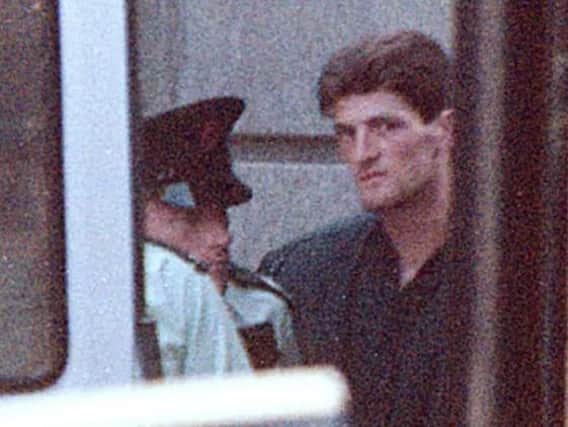 Adrian William Hayes leaves Ballymena Court in 2000 after being charged with the murder of Julie Tennant.
