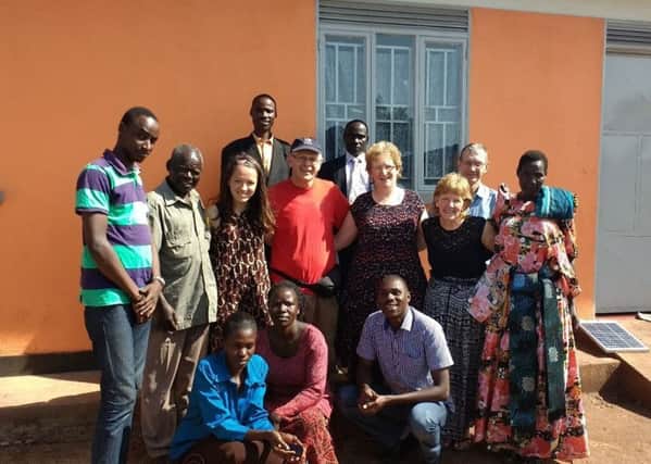 Dr Dickie Barr and his wife Janice at teacher accommodation build in Kirwala Primary School, Uganda with the help of Charlene's Project