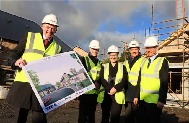 (L-R) Bob McCann, chair of the Northern Health and Social Care Trust, joins Michael McDonnell, Choice Group chief executive, Hazel Bell, chair of Choice, Peter Moran, director Todd Architects and Oscar Donnelly, Divisional director of Mental Health, Learning Disability and Community Well-Being, at the topping off ceremony of Choice Housing's Â£3.1m supported housing scheme in Whiteabbey.