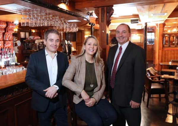 Stuart and Barbara Hughes, owners of Hughes Craft Distillery and the award-winning range of RubyBlue liqueurs, with Derick Wilson (right), Business Development Manager at Ulster Bank.