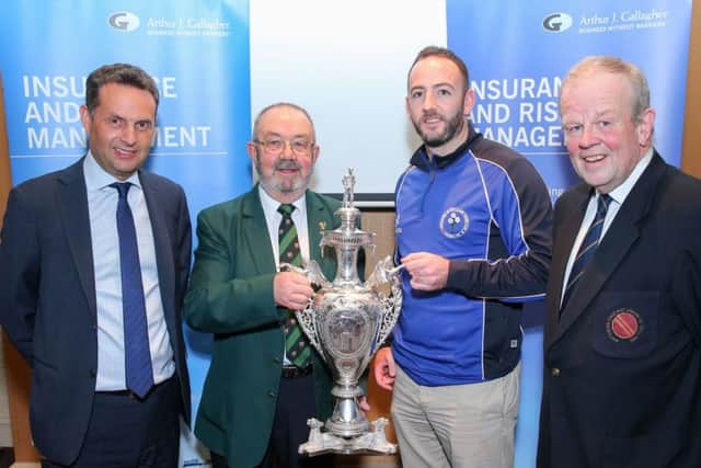 Neil Gill of Muckamore at the draw for the early rounds of the Northern Cricket Union's Arthur J. Gallagher Senior Challenge Cup at which the club received an away tie to Holywood in the first round. The draw was made by Shane Matthews (regional
managing director of AJG) and Richard Johnson (NCU).