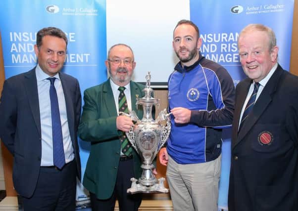 Neil Gill of Muckamore  at the draw for the early rounds of  the Northern Cricket Union's Arthur J. Gallagher Senior Challenge Cup at which the club received an away tie to Holywood in the first round. The draw was made by Shane Matthews (regional
managing director of AJG) and Richard Johnson (NCU).