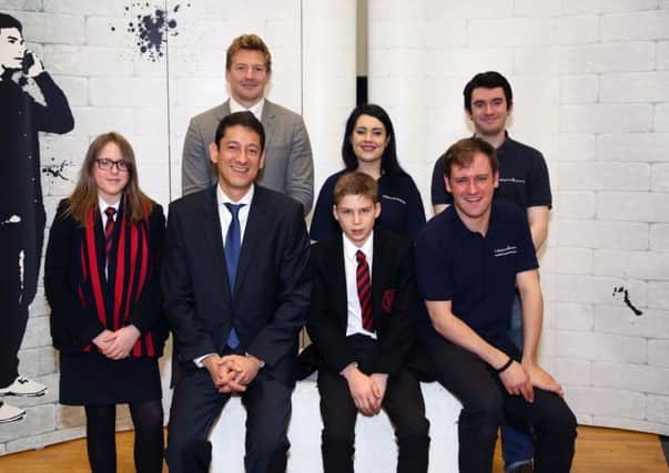 Jorge Lopes, Country Director Diageo NI with teacher Gareth Shaw and pupils Grace Marks and Nicholas McKenna and the Collingwood Learning teamCredit Â©Press Eye/Darren Kidd