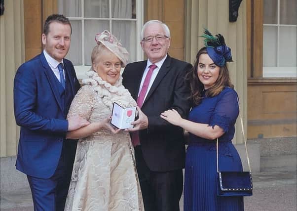 Pictured with Alderman Allan Ewart who recently received his MBE for services to local government from His Royal Highness The Prince of Wales at Buckingham Palace are his wife Denise, daughter Lynne and son-in-law Philip Givan.
