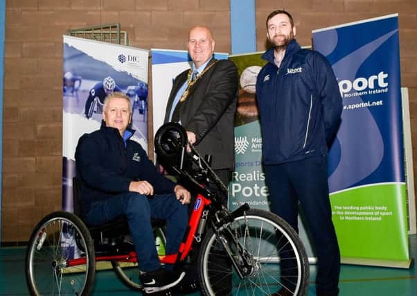 Aubrey Bingham from Disability Sport NI pictured alongside the Mayor of Mid and East Antrim, Cllr Paul Reid and Conor Cunning from Sport NI.