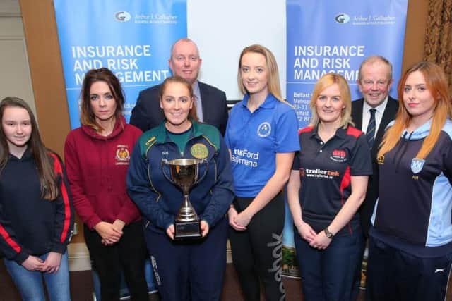 Jennifer Hanna of Donacloney Mill (first left) and Judith Latimer of Waringstown.(second from right) pictured at the draw for the Northern Cricket Unions Arthur J. Gallagher Womens Challenge Cup. The draw was made by Gordon Markey of AJG and Richard Johnson, vice chairman of the NCU.