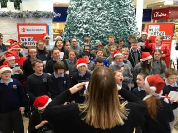 The Ardnashee School Choir performing at Foyleside Shopping Centre