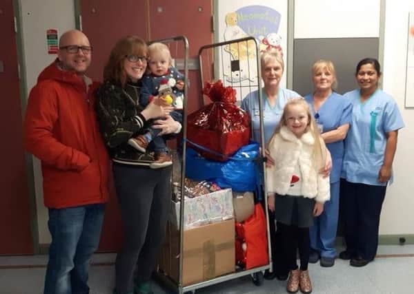 Leeann and her family pictured donating the packs to Antrim Area Hospital.