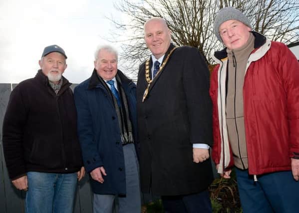 Mayor Cllr Paul Reid pictured alongside members of community group, Brighter Whitehead. Council is to open three new Men's Sheds in the borough.