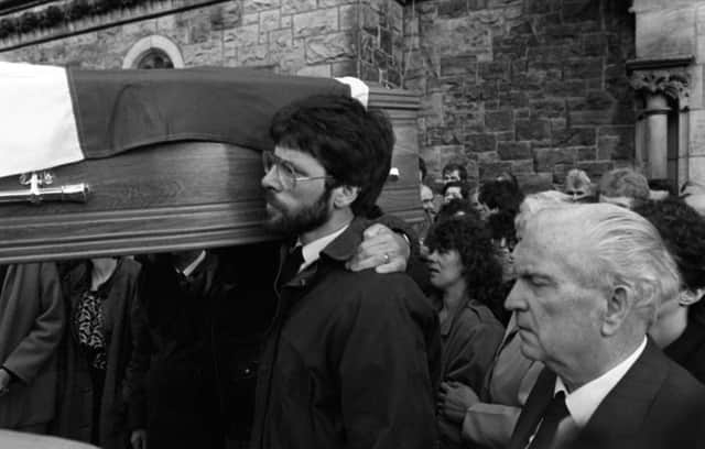 Gerry Adams carries the coffin of IRA man Paddy Kelly, one of eight terrorists killed at Loughgall RUC station in May 1987