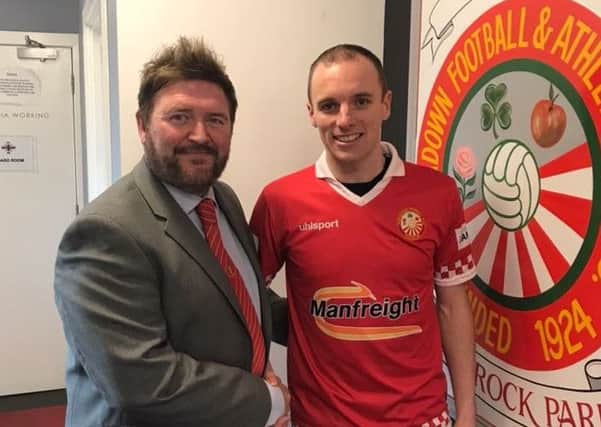 Portadown manager Niall Currie welcomes Gregg Hall to Shamrock Park. Pic courtesy of Portadown Football Club.