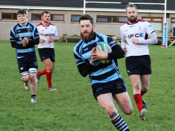Ballymoney Centre, Martin Irwin, scores the first of his brace of tries against Malone in their Conference League match. PICTURE: Uel McDowell