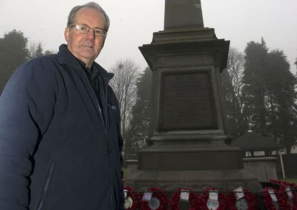Cllr Billy Henry at the memorial.  INBT 03-720-CON