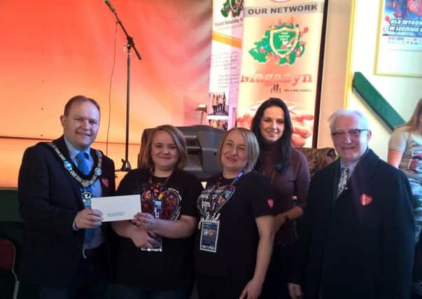 Lord Mayor of Armagh City, Banbridge & Craigavon Borough Council DUP Alderman Gareth Wilson has visited a special Polish charity afternoon in Lurgan Town Hall.