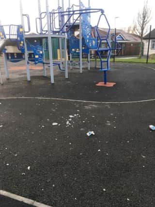 Broken glass on children's play area in north Lurgan