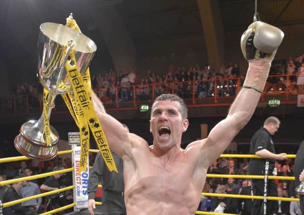 Eamonn O'Kane celebrates his victory in the 2012
Betfair Prizefighter Irish Middleweights competition at The King's Hall, Belfast.