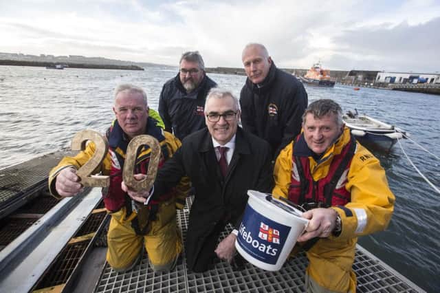 Northern Ireland wind energy company, Simple Power, has announced its long-term support for the RNLI (l-r) Coxswain Des Austin, Kerry Gregg, Deputy Launching Authority, Simple Power Chief Executive Philip Rainey, Life Boat operations manager Keith Gilmore and crew member Tim Nelson.