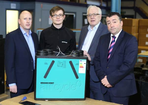 Pictured with David Johnston (second from left), who is working on the assembly of a Brookvent 'aircycle' ventilation unit are Donal Rogan (left), Director of Transformation, Lisburn & Castlereagh City Council; Alderman Allan Ewart MBE, Chairman of the council's Development Committee and Declan Gormley (right), Managing Director of Brookvent.