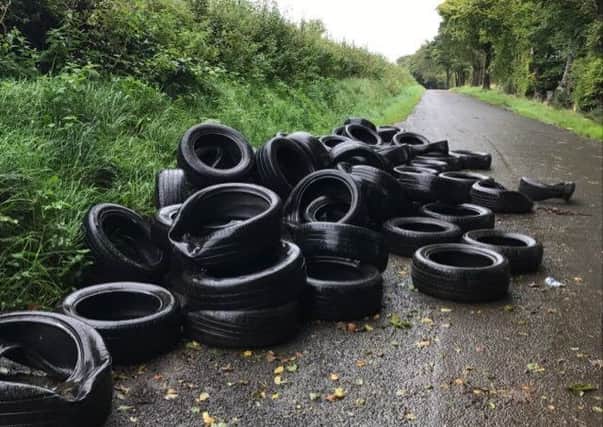 Dozens of tyres illegally dumped on a rural road on the outskirts of Lisburn.