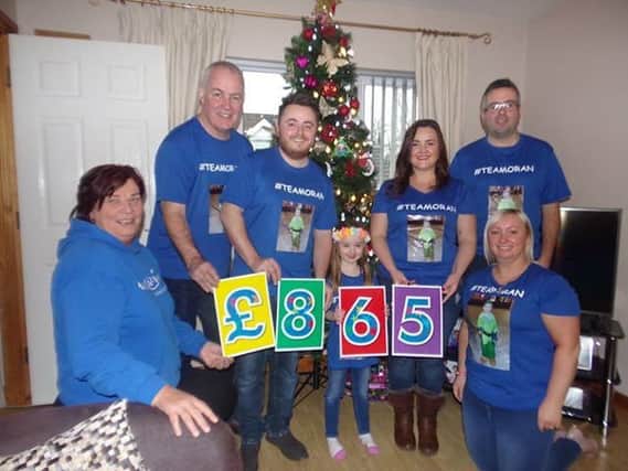 Pictured from L-R Gail McKee from Make-A-Wish, Raymond Murray, Aaron Murphy, Molly Creaney, Nicola O'Hara, Barry Creaney and Aisling Creaney)
