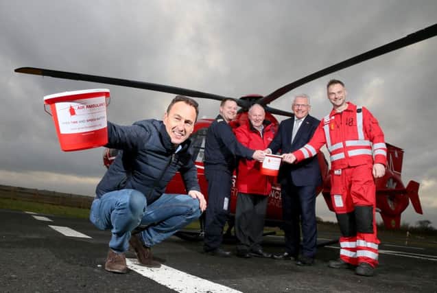 PACEMAKER, BELFAST, 17/1/2018: Former Vauxhall International North West 200 race winner, Jeremy McWilliams joins Event Director, Mervyn Whyte and Air Ambulance NI Chairman, Ian Crowe to announce the  selection of AANI as the race festival's chosen charity for 2018. Also included are pilot, Richard Steele and Paramedic, Stuart Stevenson.
PICTURE BY STEPHEN DAVISON