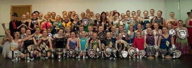 Ballymena Dance Academy members pictured with some of their many awards.