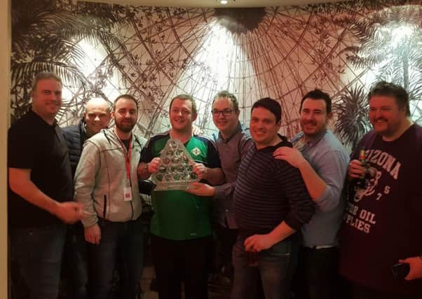 Members of the 147 club in Antrim celebrate: from left to right, John Robinson, Ryan McQuillan, Rab Fee, Masters champion Mark Allen, Declan Lavery, Alastair Wilson, Aaron Allen and Johnny Robinson.