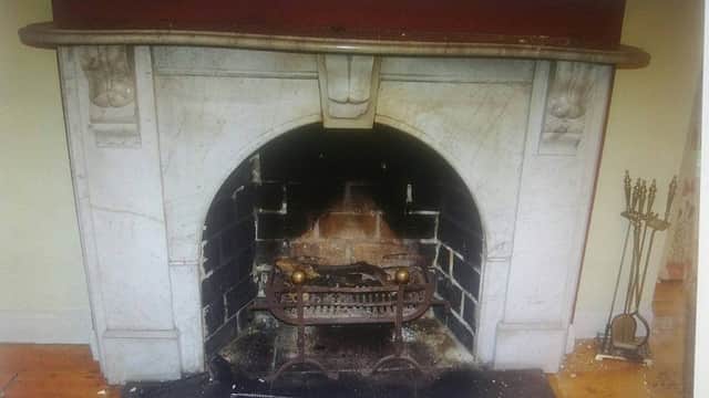 The stolen marble fireplace.