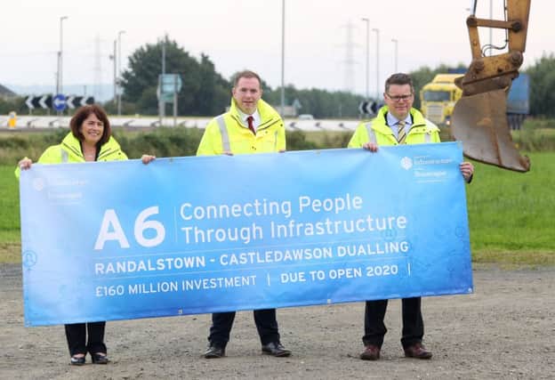 Deirdre Mackle, Divisional Roads Manager;  Infrastructure Minister Chris Hazzard; and Andrew Hitchenor, Strategic Road Improvements Manager at the launch of the Â£160m A6 Randalstown to Castledawson Dualling Scheme in 2015.