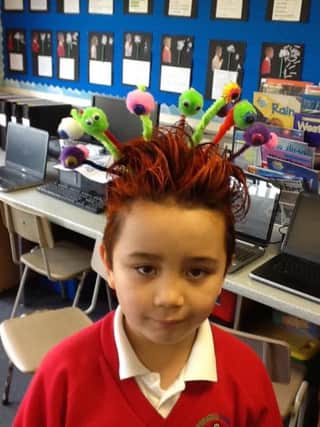 Crazy Hair Day raising funds for toilet facilities in Africa as part of Spires PS RRS project. The Award recognises achievement in putting the United Nations Convention on the
Rights of the Child at the heart of a schools planning, policies and practice. A Rights Respecting School is a community where childrens rights are learned, taught, practised, respected, protected and promoted.