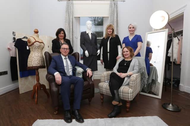 At the official opening of the newly decorated boutique within Dress for Success - Foyle are Kieran McCauley, store manager,  Crescent Link, and Louise Kirkpatrick, field visual manager, both M&S; back, from left, Marie Brown, director, Foyle Women's Aid, Deirdre King, Deirdre King HR Ltd.,  and Louisa Young, stylist.